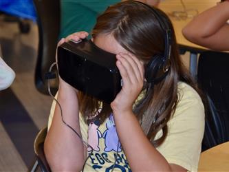 Child wearing Virtual Reality headset